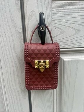 Most Wanted: Burgundy PVC-Jelly Crossbody Bag with Gold Turn-Lock